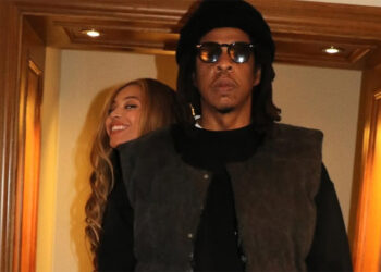 jay-z and beyonce in a hallway